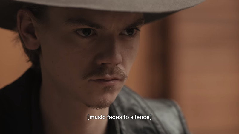 Benny from Queen's Gambit staring intensely with caption "[music fades to silence]"